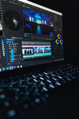 Video editing software being used to produce a business marketing video.
