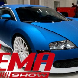 Image of a blue Bugatti Veyron at the 2021 SEMA show in Las Vegas.